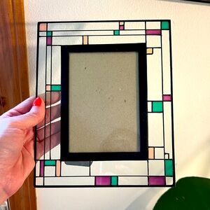 Stained glass picture frame with purple, peach and green accents